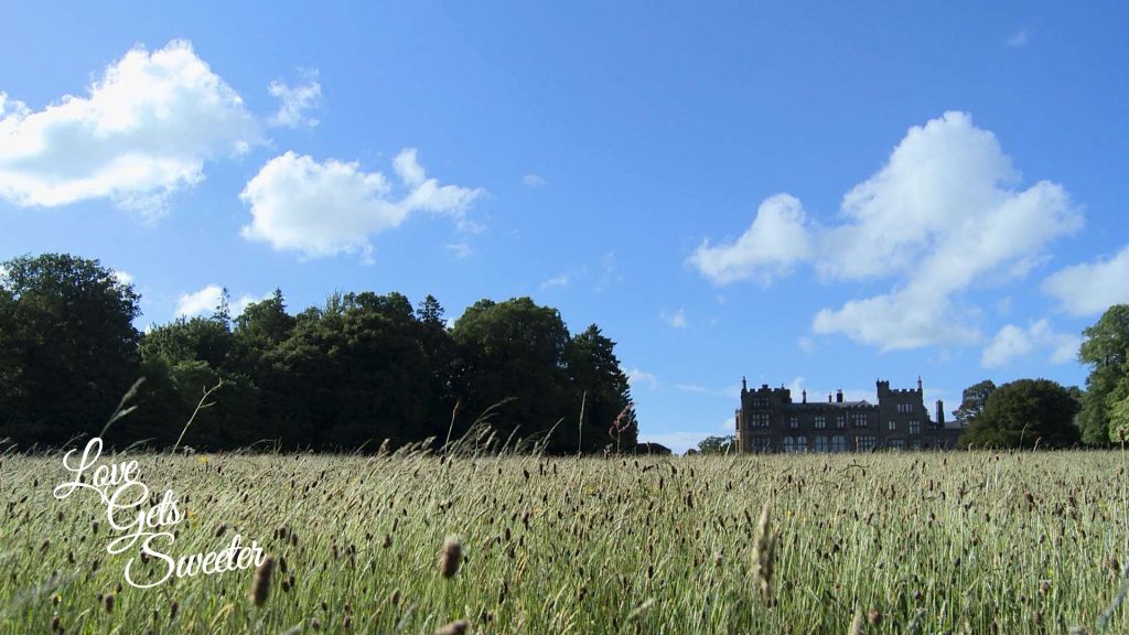 Love Gets Sweeter videography film the bright blue sky and sunshine during a wedding. Showing Armathwaite hall hotel to be the perfect luxury country wedding venue in the lake district in Cumbria